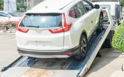 Towing A Broken-Down Car From A Parking Garage